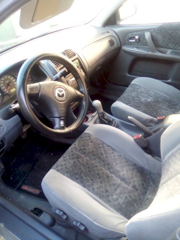Mazda 323 1,5 i, klima, reg.6/22
